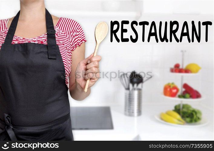 Restaurant cook holding wooden spoon background.. Restaurant cook holding wooden spoon background