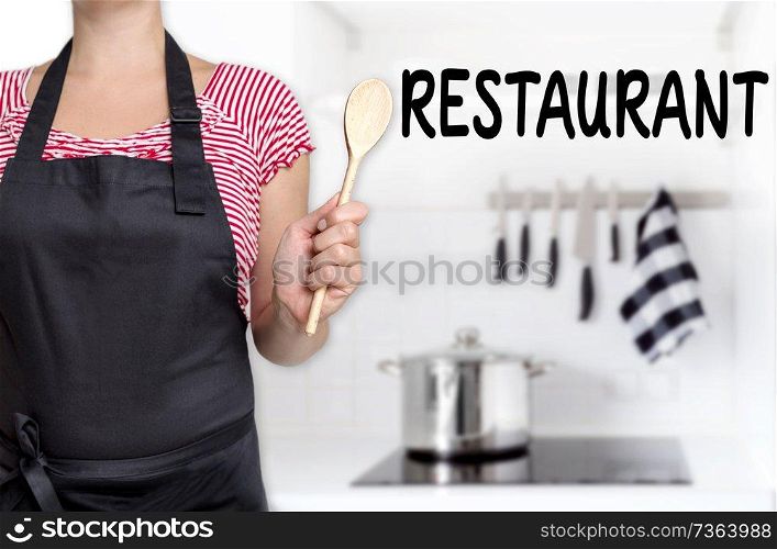 Restaurant cook holding wooden spoon background.. Restaurant cook holding wooden spoon background