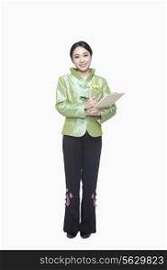 Restaurant/Hotel Hostess in traditional Chinese clothing holding clipboard