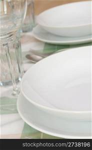 Restaurant With Set Table - Plates, Cutlery and Glasses