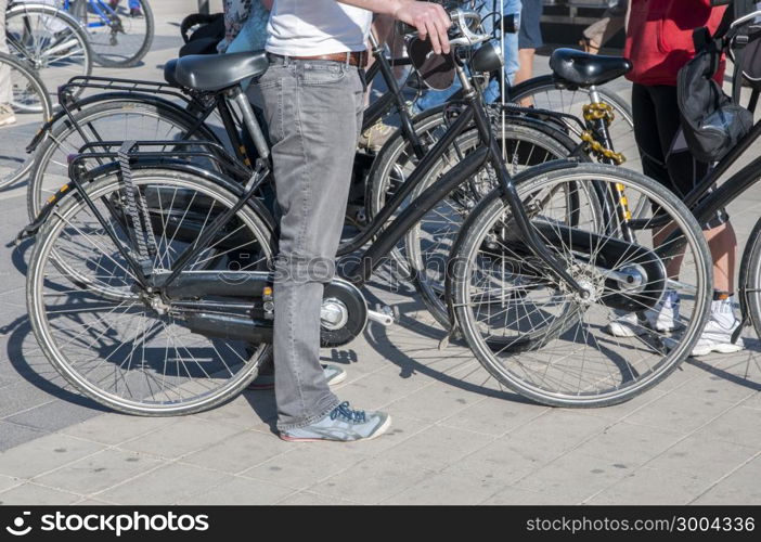 resting cyclists with their bikes