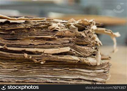 Restoration laboratory. Closeup of sheets of ancient books