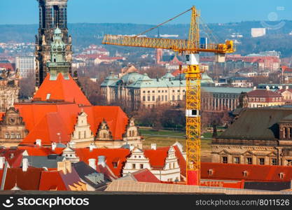 Restoration work in the center of the Old Town in Dresden, building site, crane on the background Hofkirche, Saxony, Germany