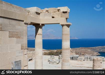 Restored and original pieces of the ancient temple of Athena Lindia on the Acropolis of Lindos in the Dodecanese island of Rhodes, Greece.