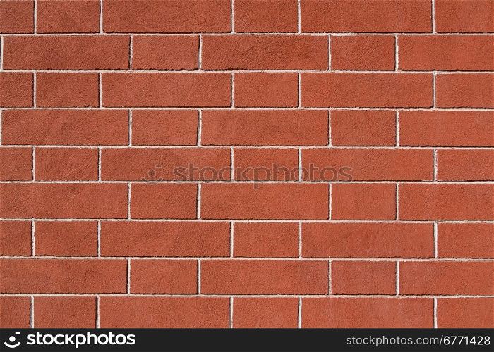 Restored old brick wall, exterior surface, good condition