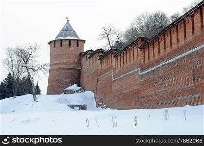 Restored wall and tower of Nizhny Novgorod Kremlin, winter time. Russia