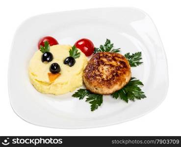 Restourant serving dish for child`s menu - potato puree, cutlet with face on white background