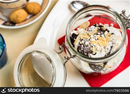 Restourant serving dish - sweet dessert in glass on table