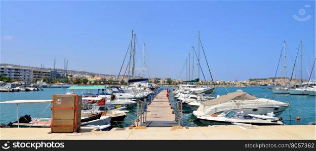 RETHYMNO, GREECE - 08.03.2016: modern harbour with boats panorama view