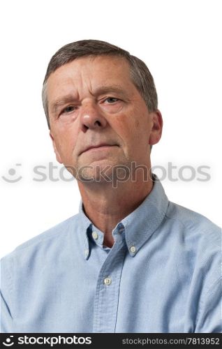 Retired executive looks pensively towards the camera and isolated against white