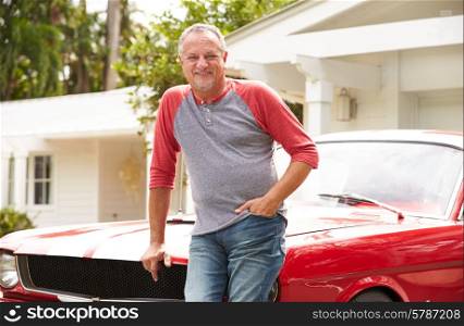 Retired Senior Man Standing Next To Restored Classic Car