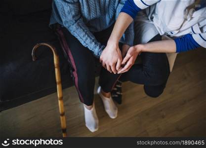 retirement home concept with nurse woman holding hands. Resolution and high quality beautiful photo. retirement home concept with nurse woman holding hands. High quality and resolution beautiful photo concept