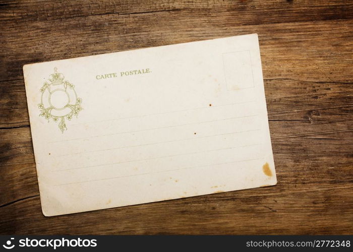 Retro 1900th postcard on wooden table