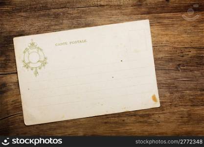 Retro 1900th postcard on wooden table