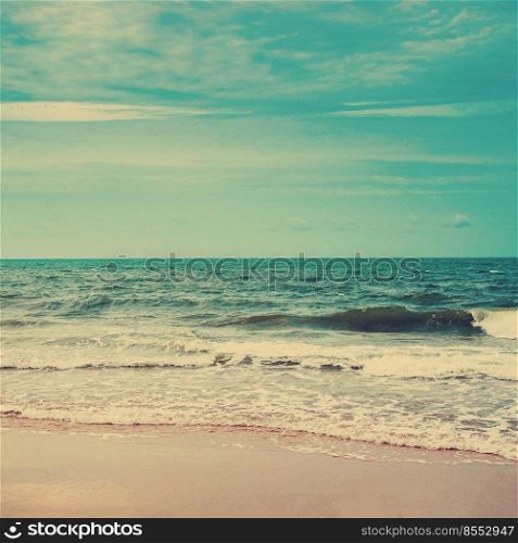 Retro beach and blue sky with vintage tone.