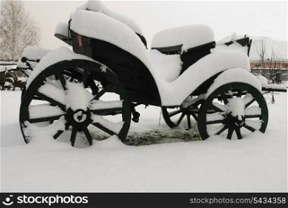 Retro carriage of red soviet army under the snow