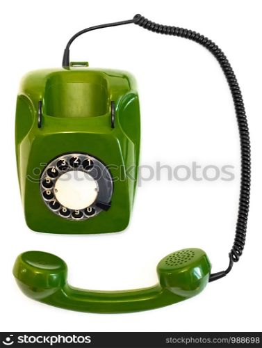 Retro green rotary telephone on a white background. Old green rotary telephone on a white background