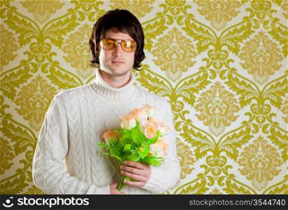 retro hip young man vintage glasses holding valentines flowers bouquet on wallpaper