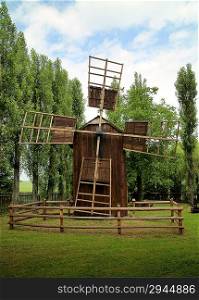 Retro image of old wooden Windmill