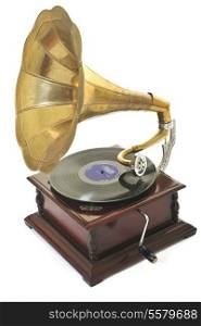 retro old gramophone with horn speaker for playing music over plates isolated on white in studio