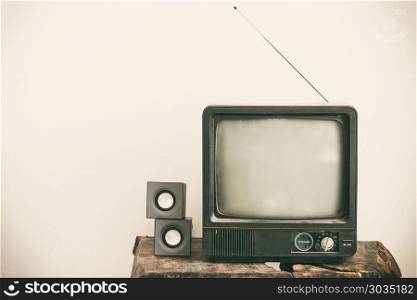 Retro old television on table. Vintage retro style.