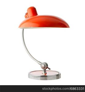 Retro orange table lamp on on white background.