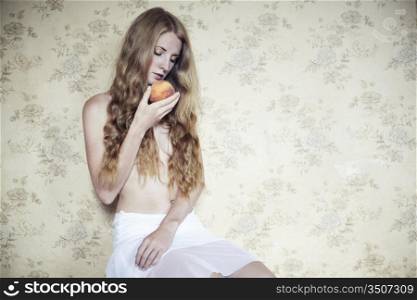 Retro photo of a beautiful young woman with peach