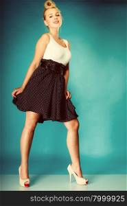 Retro pin up woman style. Beauty young full length girl in studio. Vintagee photo.