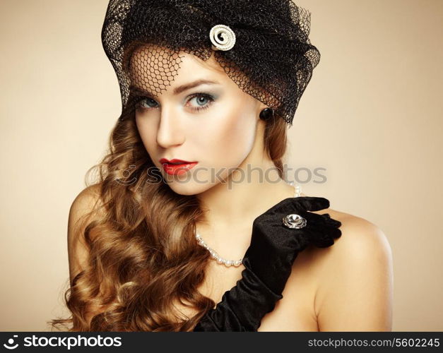 Retro portrait of beautiful woman. Vintage style. Fashion photo