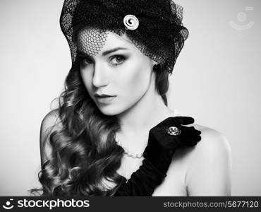 Retro portrait of beautiful woman. Vintage style. Fashion photo. Black and white