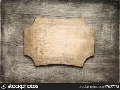retro sign board at dark plywood wooden background texture