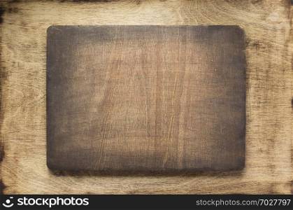 retro sign board at dark plywood wooden background texture