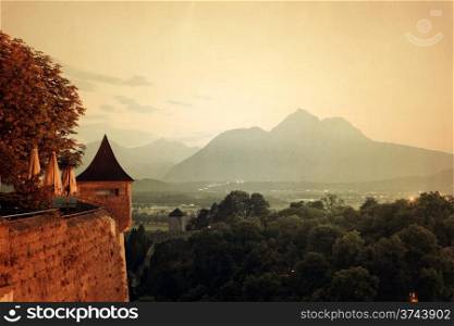 Retro style panorama of mountains in the alps at sunset. Salzburg, Austria