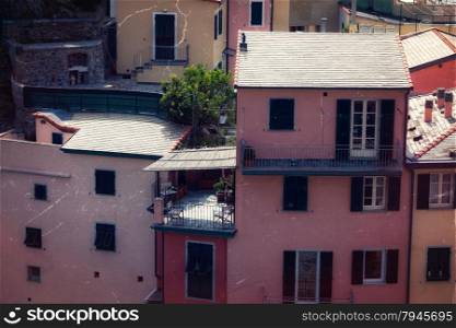 Retro style photo of houses on the hill