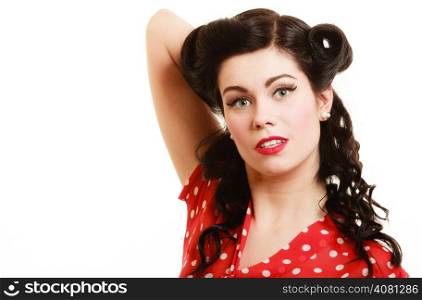 Retro style. Portrait of stylish young woman isolated on white. Face of brunette girl with pinup hairstyle and makeup.