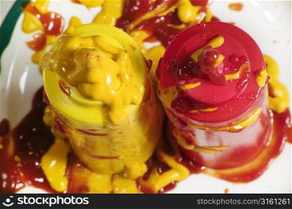 Retro tomato ketchup and mustard bottle and tomato ketchup and mustard everywhere