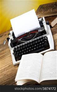 Retro typewriter with white paper