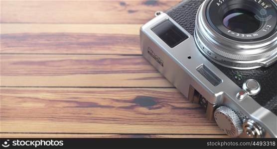 Retro vintage camera on wood table background. Space for text. 3d illustration