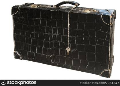 Retro vintage used suitcase of black patent leather isolated on white background