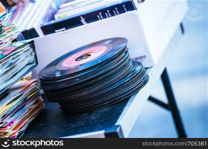 Retro vinyl records on a flea market, summer time