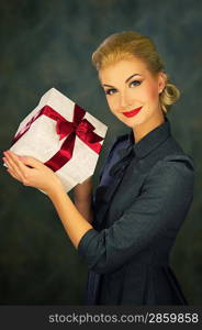 Retro woman with a gift box.