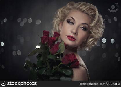 Retro woman with red roses portrait