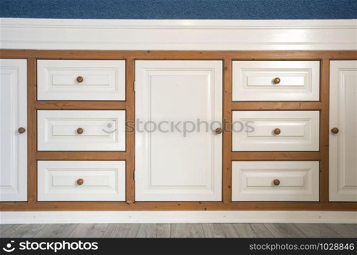 retro wooden closet with drawers closeup, modern interior minimalist style wardrobe clean. retro wooden closet with drawers closeup, modern interior minimalist style wardrobe