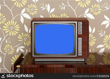 retro wooden tv on wooden vitage 60s furniture floral wallpaper
