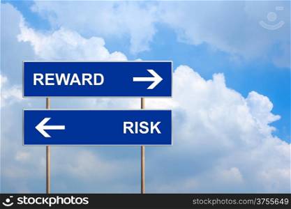 Reward and risk on blue road sign with blue sky