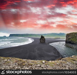 Reynisfjara Black Beach on a cloudy summer morning, Iceland.