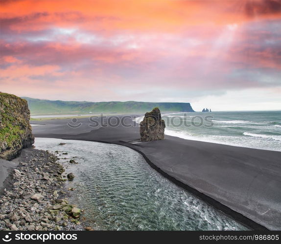 Reynisfjara Black Beach on a cloudy summer morning, Iceland.