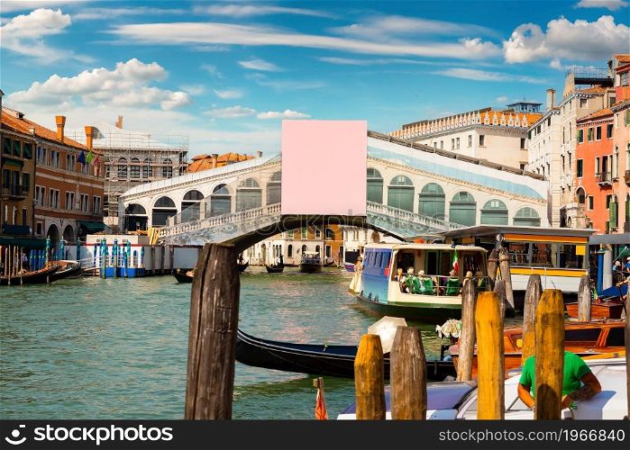 Rialto bridge and gondolas in Venice, Italy