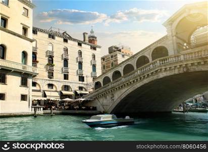 Rialto bridge and ship in Venice, Italy