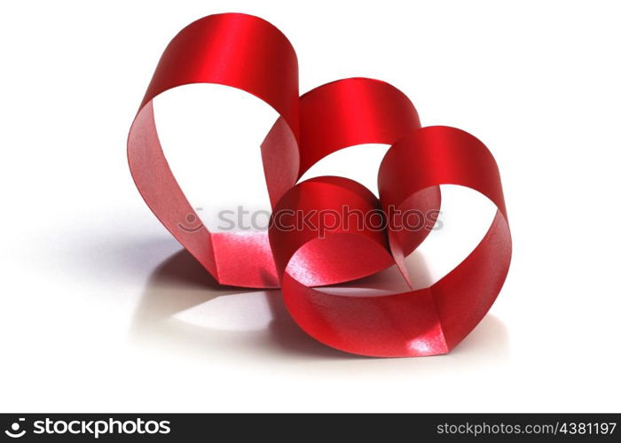 Ribbons shaped as hearts on white, valentines day concept